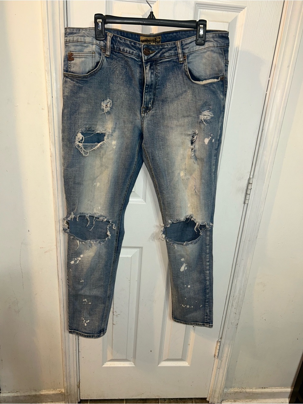 Distressed Grindhouse Light Wash Ripped Jeans